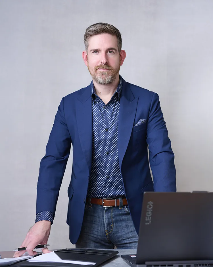 Professional man Dave in business casual with approachable demeanor